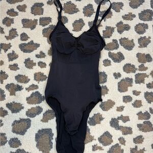 Black SKIMS shapewear tank